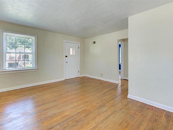Living/dining area looking toward front door