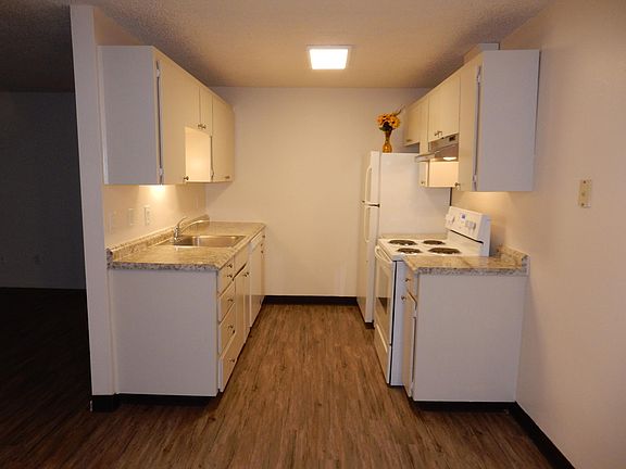 Well lighted Kitchen with new appliances and countertop