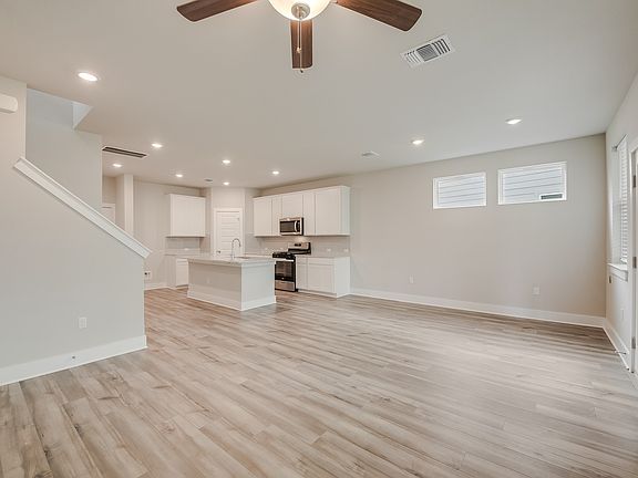 The open-concept living and dining areas make this home perfect for entertaining.