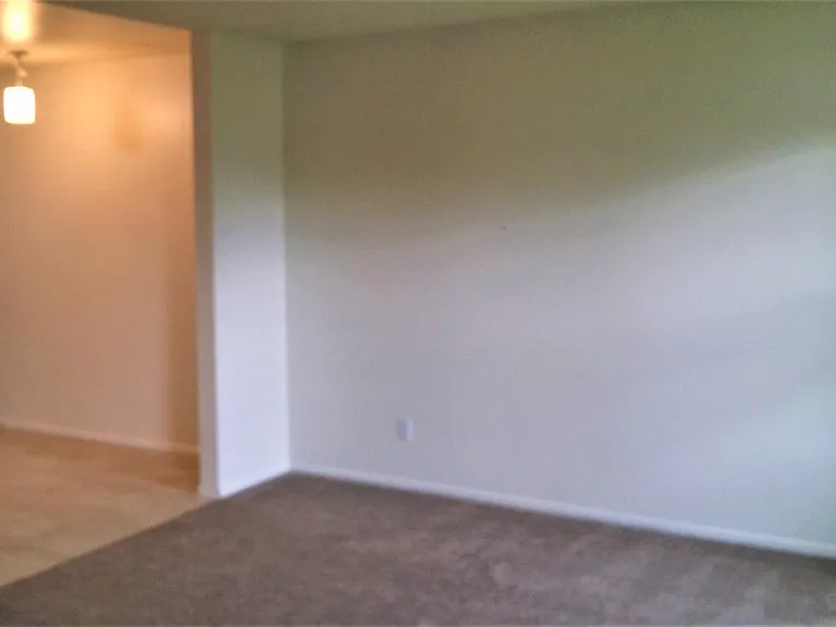 Living Room looking into Kitchen eating area