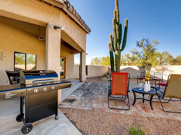 Covered Rear Patio with Private Fenced Yard