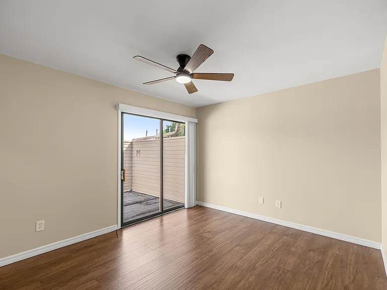 View of the upstairs balcony from the primary bedroom