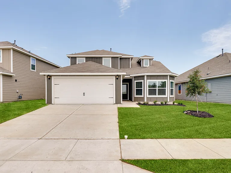 The beautiful Cypress floor plan is a two-story home with an attached 2-car garage.
