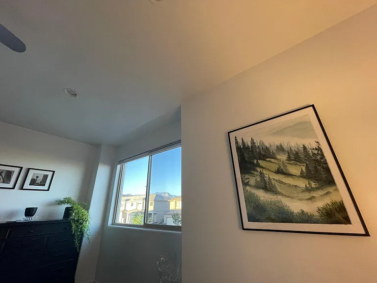Looking out the window in the master bedroom