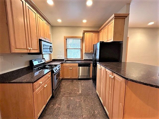 Fully equip Kitchen 
Granite Island- Eat at bar