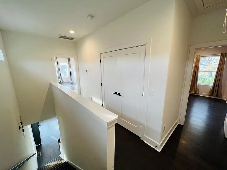 Master to the left; one of the jack and jill rooms on the right. Washer/Dryer split the two