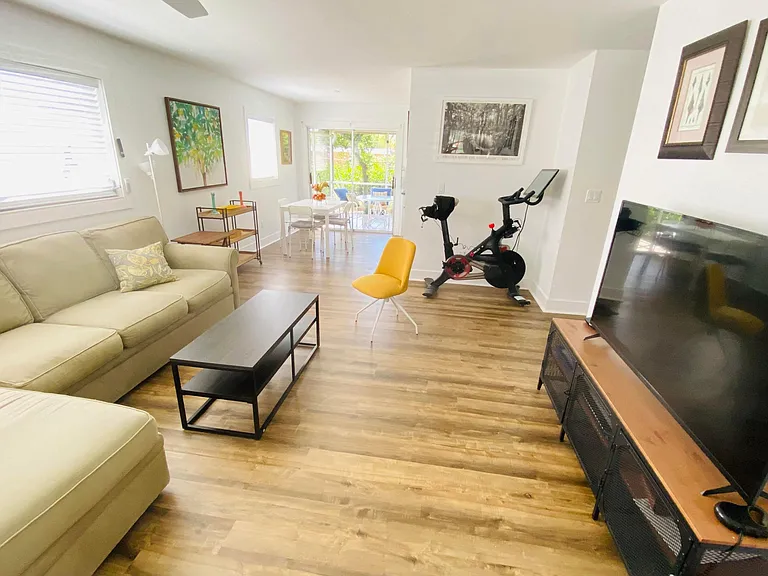 View from entrance facing kitchen straight ahead and hallway to the right.
