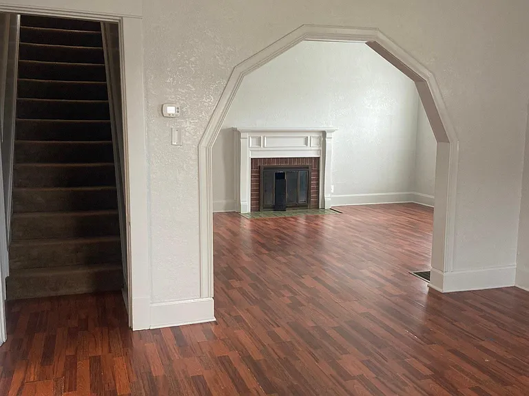dining room looking into living room and upstairs