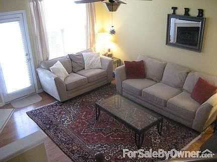 Living Room : Huge living area with TV niche, gas fireplace, and room at the bar for stools!