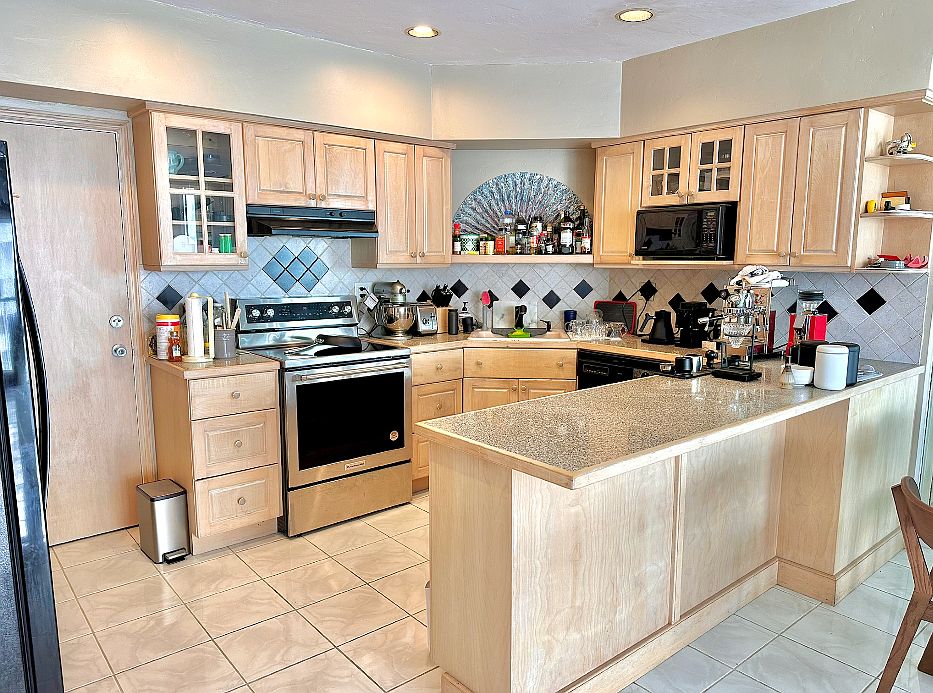 Kitchen with new electric stove and oven range