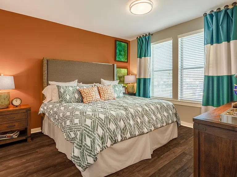 Bedroom with wood-designed flooring