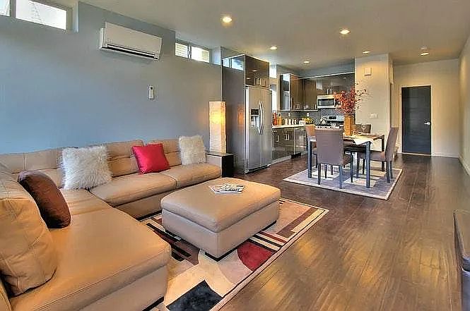 Entry way on the 1st floor. Open kitchen and living area.