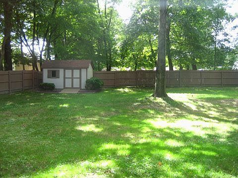 Large Backyard with Privacy Fence and Shed