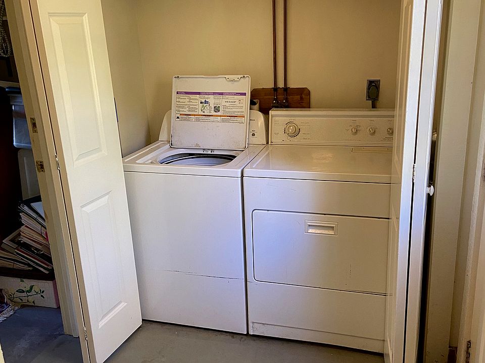 Washer dryer located at the apartment entrance