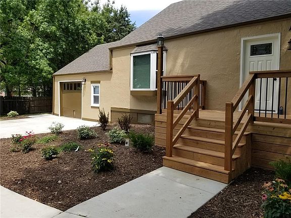 Real stucco home with new roof, paint, deck, concrete, landscaping, windows, and doors. WOW!
