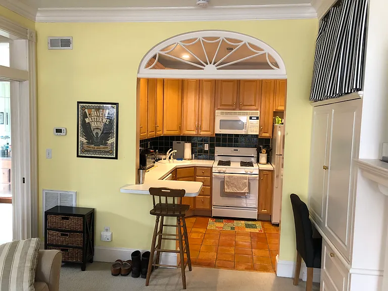 LIVING ROOM LOOKING INTO KITCHEN