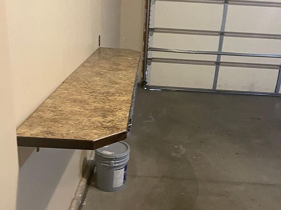 Garage with storage shelf