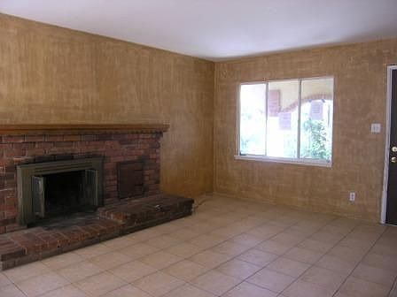 Brick fireplace w/ mantle