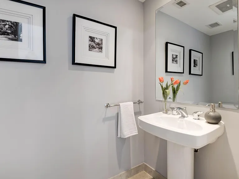 powder room on first floor with pedestal sink