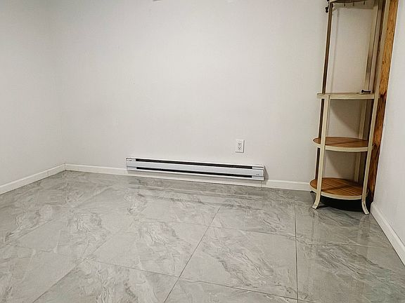 5th image of 210-32 23rd Ave #B