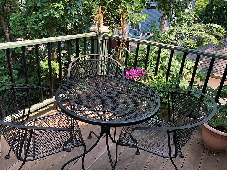 Balcony with seating area just outside the kitchen