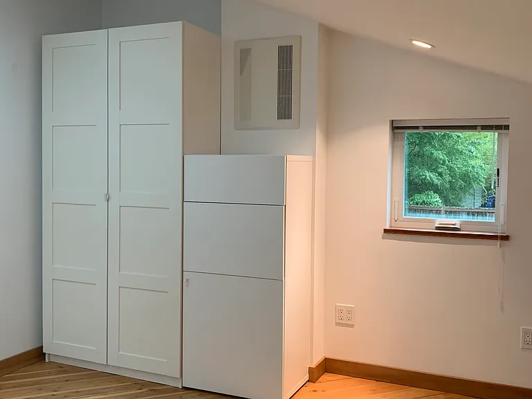 Bedroom closet and dresser.