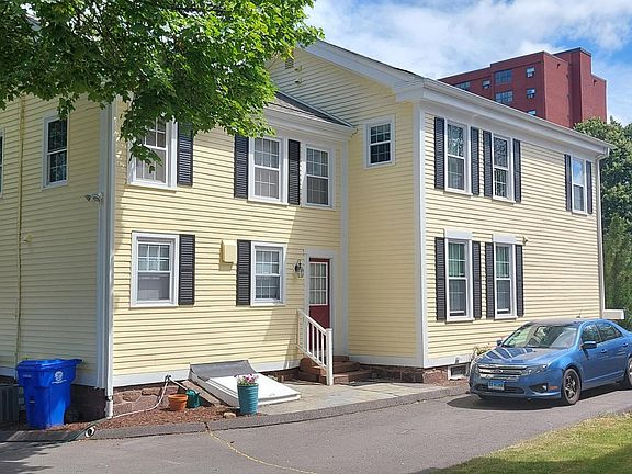 Driveway and side entrance to 1st floor