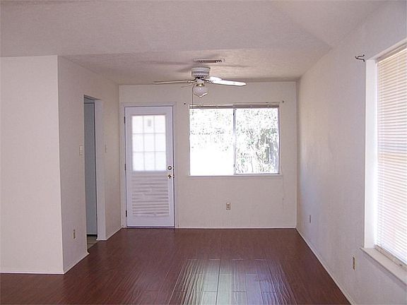 Dining area with great view of Pear Tree in backyard. Bamboo laminate flooring.