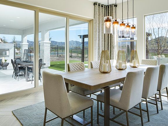 Access from the kitchen and gathering room is the cafe for formal or casual dining parties