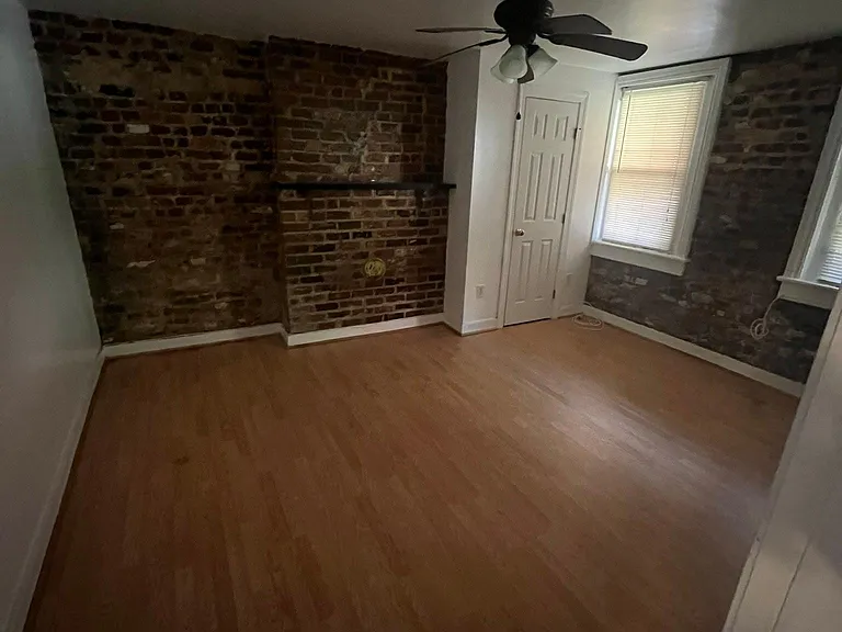 Bedroom 4 (downstairs, backyard-facing)