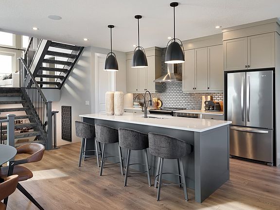 Create culinary magic in this contemporary kitchen, where style seamlessly meets functionality.