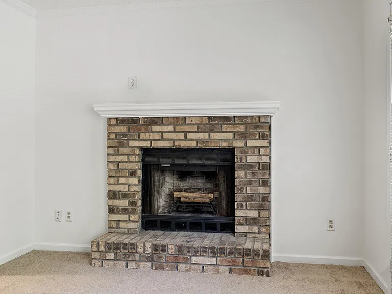 Classic brick wood-burning fireplace _ the perfect focal point for winter evenings