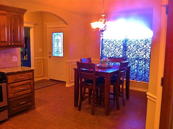 Front door  and dining area