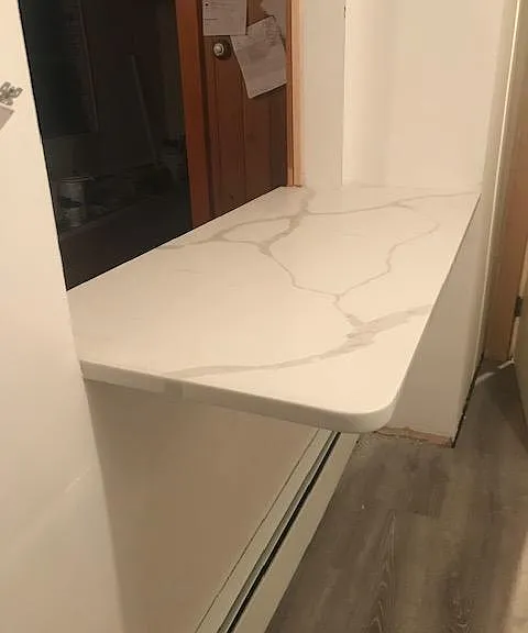Brand New Quartz Breakfast Bar Island opens into bright clean dining room Fresh white / grey paint, flooring, new kitchen
