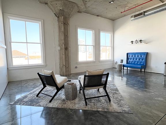 Living Room Downtown Street View, Midcentury Lounge Chairs