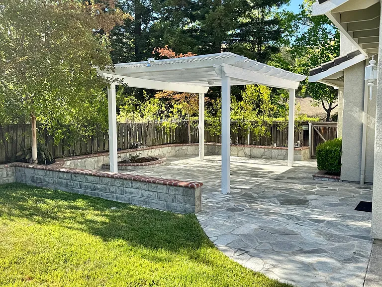 Beautiful, landscaped backyard with pergolas ready to entertain