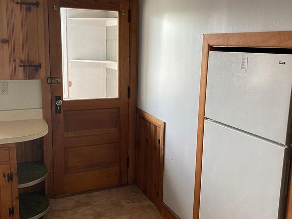 Kitchen & door to storage / deck