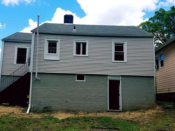 Rear of home and basement entry