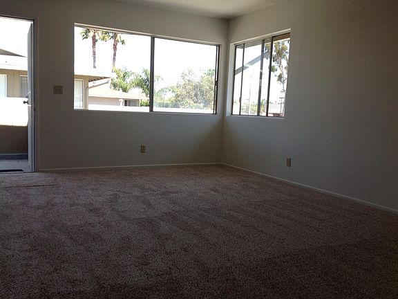 Living room with large windows, light and bright.