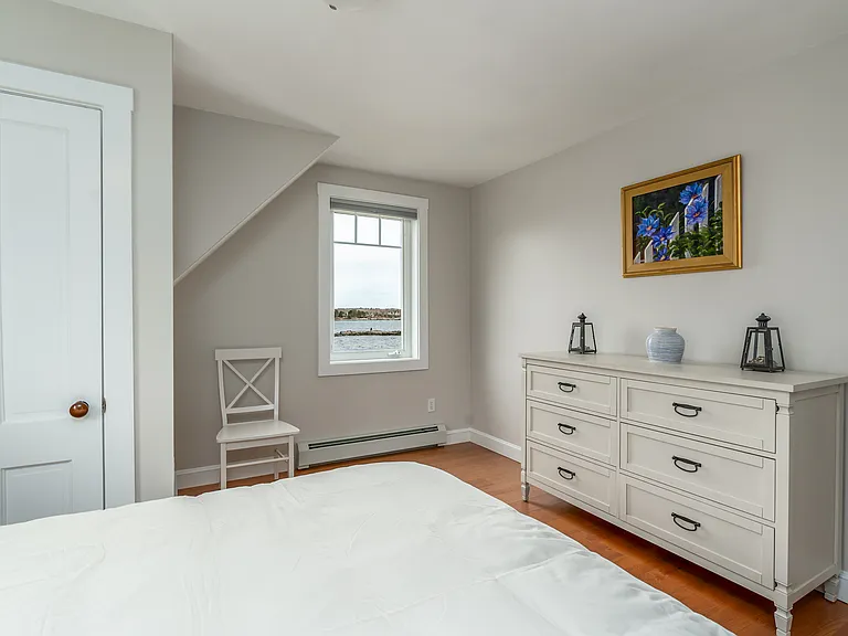 The third floor bedroom with a queen bed. Ocean views.