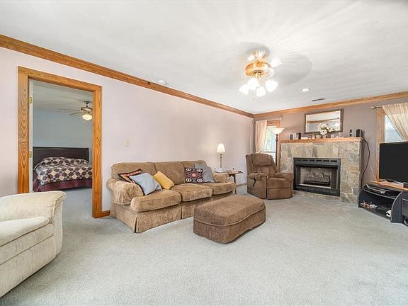 Living Room with Stone Gas Ventless Fireplace
