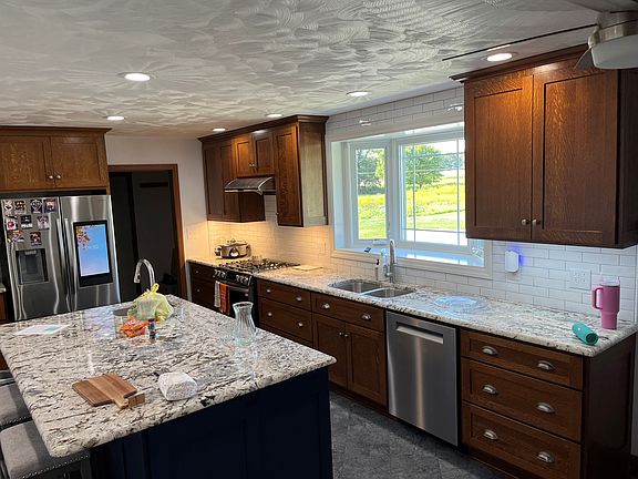 New kitchen, highlighting the all new stainless steel appliances.