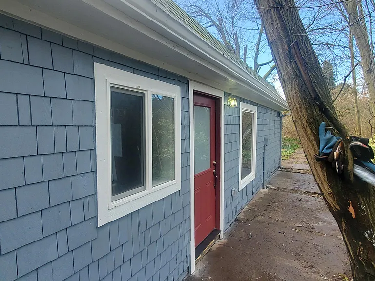 The house is near the alley, set well back from the street. Very private!
