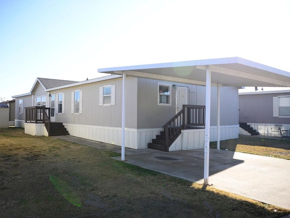 Front View w/ Extra tall Carport