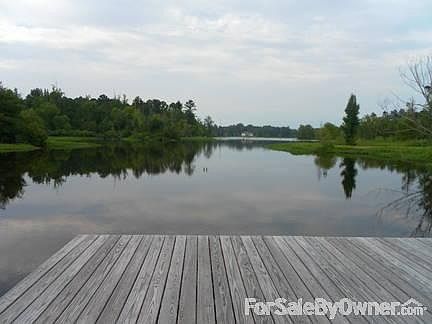 BEAUTIFUL
						:
						Large front porch and mature landscaping