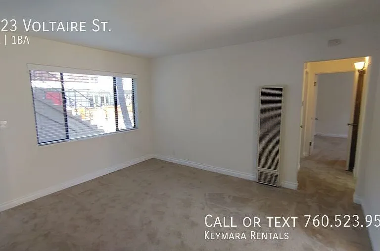 5123 Voltaire St — Photo 7