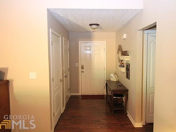 Foyer looking from living room to the front door