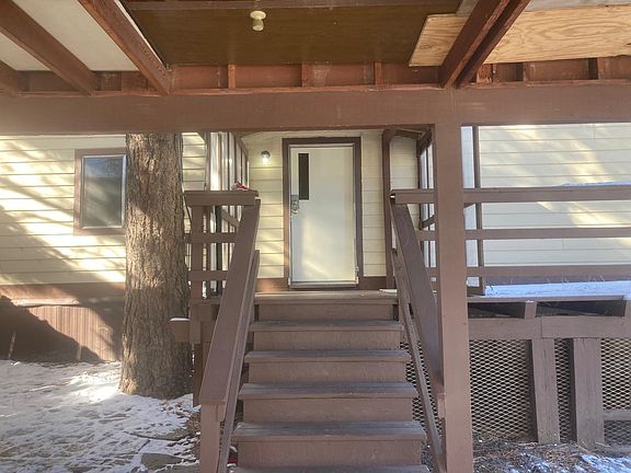 The stairs allow access from the carport to the front porch and door without exposure to rain or snow.