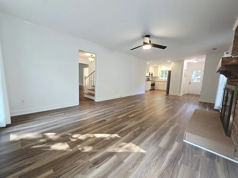 Great room (living space 2) with ornamental fireplace.