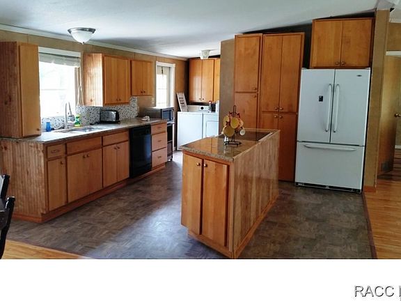 4th image of 7561 N Citrus Ave